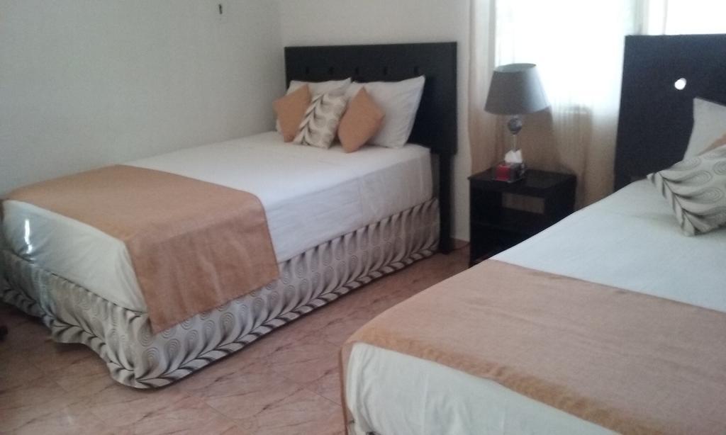 Room in Cancun Deluxe Buitenkant foto